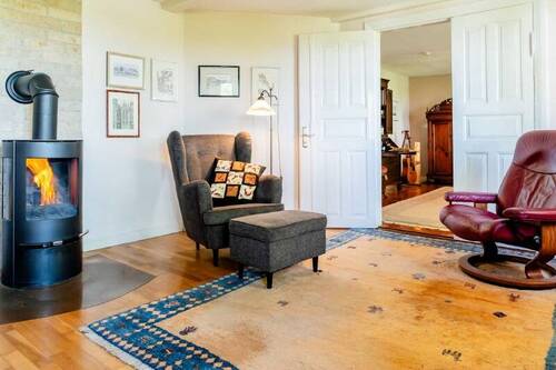 18 Wohnzimmer mit Ofen - 