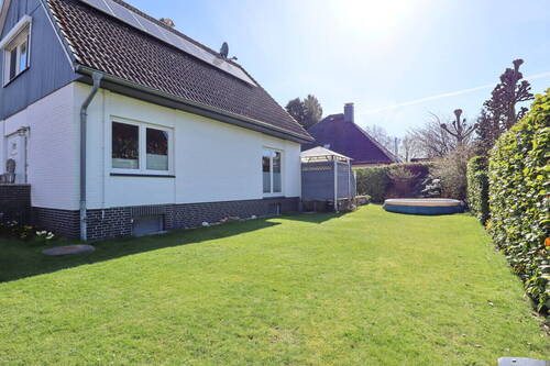 Seitenansicht - Einfamilienhaus mit 136,00 m&sup2; in Hetlingen zum Kaufen