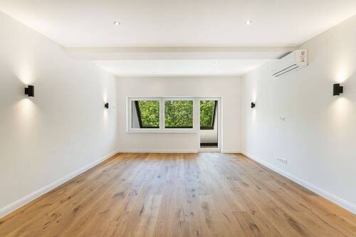 Wohnzimmer - Zeitlose Eleganz im kernsanierten Altbaujuwel