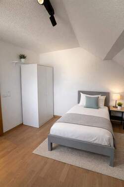 Schlafzimmer 2 im Dachgeschoss - 