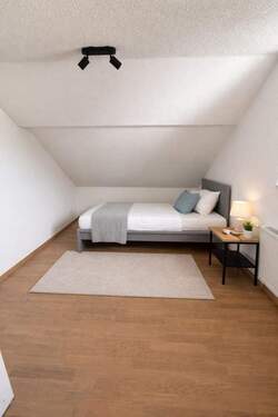 Schlafzimmer 3 im Dachgeschoss - 