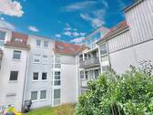 Rückansicht mit Balkon - 