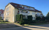 Hausansicht - Etagenwohnung mit 55,60 m² in Urbich zum Kaufen