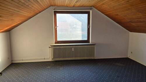 Zimmer im Obergeschoss - 