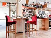 Frühstücksbar in der Wohnküche im Erdgeschoss - Mehrfamilienhaus, Wohnhaus mit 246,50 m² in München zum Kaufen