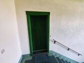 zur Wohnung - 