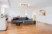 Das offene Wohnzimmer - Top-renovierte 3-Zimmer Eigentumswohnung in Auggen