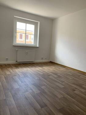 Musterbild Wohnzimmer - Etagenwohnung mit 56,40 m&sup2; in Halle zur Miete
