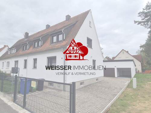 Titelbild - Wohnen mit Hausfeeling: Helle 4-Zimmer-Wohnung mit Garage & Gemeinschaftsterrasse in Fürth-Stadeln