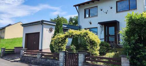 Titelbild - Einfamilienhaus in ruhiger Lage, mit traumhaftem Ausblick und viel Entwicklungspotenzial