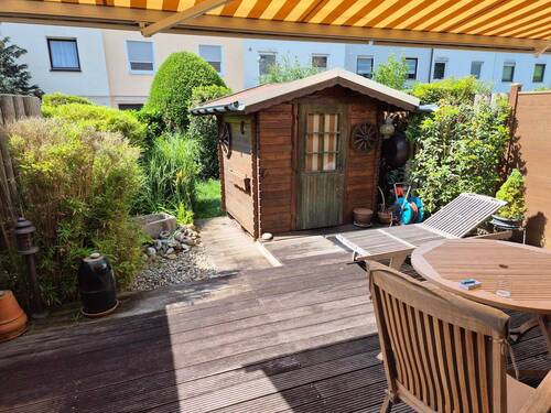 Blick in den Garten - Reihenmittelhaus mit 132,00 m² in Dietzenbach zum Kaufen