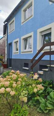 Bild 2 - 7 Zimmer Mehrfamilienhaus, Wohnhaus zum Kaufen in Hottenbach