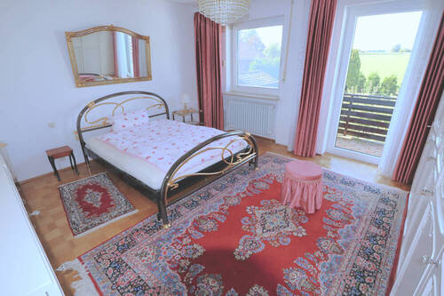 Schlafzimmer mit Balkon - 