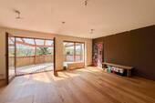 Wohnzimmer - Architektenhaus in erster Reihe mit unverbautem Blick ins Naturschutzgebiet - Wohnen wie im Urlaub!