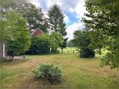 Gartenansicht - Mehrfamilienhaus, Wohnhaus mit 146,00 m² in Rhede / Büngern zum Kaufen