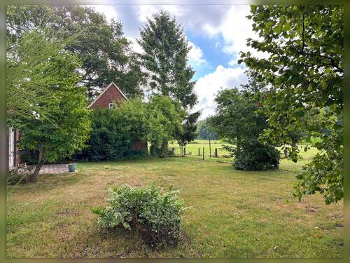 Gartenansicht - Mehrfamilienhaus, Wohnhaus mit 146,00 m² in Rhede / Büngern zum Kaufen