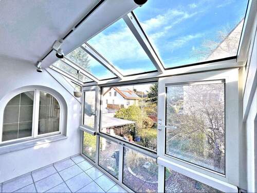 Wintergarten der Maisonettewohnung - Einfamilienhaus in München zum Kaufen