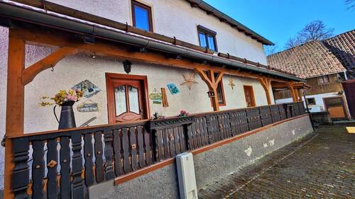 Hauseingang mit Laubengang - Einfamilienhaus mit 170,00 m&sup2; in Reurieth zum Kaufen