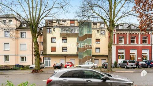 Außenansicht 2 - Bezugsfrei! Großzügige 6-Zimmer-Wohnung mit Balkon, EBK und 4 Stellplätzen in Wetter (Ruhr)