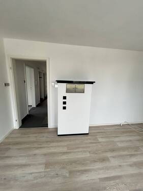 Wohnzimmer mit Kachelofen im DG - 