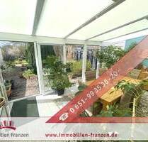 Wohnen mit Wohlfühlfaktor - Einfamilienhaus mit Garten, Wintergarten und Sauna - Trier / Irsch