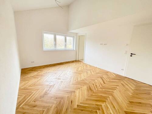 Schlafzimmer 1 mit Zugang zum Bad en Suite - 