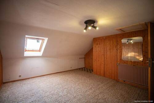 Zimmer im Dachgeschoss - 