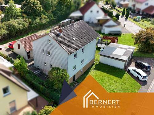 Seitenansicht - Mehrfamilienhaus, Wohnhaus mit 150,00 m² in Weitramsdorf zum Kaufen