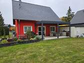 Hinteransicht mit Terrasse - 