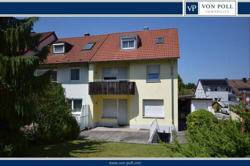 Südansicht - Garten - Modernisiertes Mehrfamilienhaus mit drei vermieteten Wohneinheiten und Garage