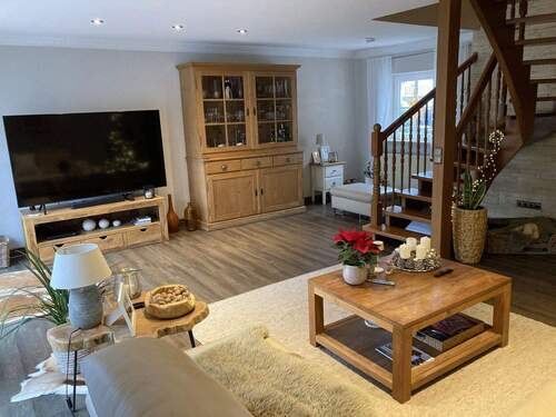 Wohnzimmer - Einfamilienhaus mit 140,00 m&sup2; in Rüsselsheim zum Kaufen