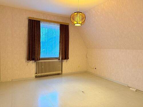 Zimmer im Dachgeschoss - 