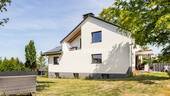 Außenansicht 2 - Modernisiertes Einfamilienhaus mit großzügigem Wohnkomfort und nachhaltiger Technik