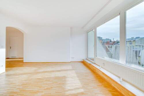 Wohnzimmer - AIGNER - Helle Dachgeschosswohnung über den Dächern des Glockenbachviertels