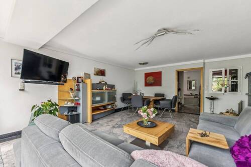 Wohnzimmer - Familientraum in Unterschleißheim: Gepflegtes Reihenhaus mit Dachterrasse, Kamin & sonnigem Garten