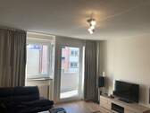 Wohnzimmer mit Balkon - 