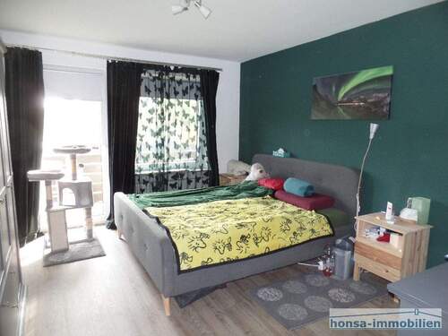 Schlafzimmer mit Balkonzugang - 