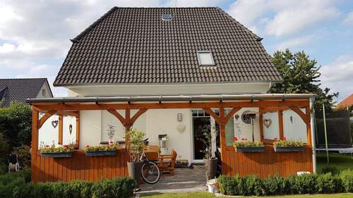 Gartenansicht mit Überdachung 25,3 m² - 