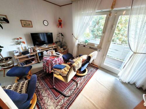 Zimmer mit Balkon im Obergeschoss - 