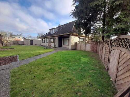 Haus Gartenansicht - Mehrfamilienhaus, Wohnhaus mit 380,00 m&sup2; in Neumünster zum Kaufen