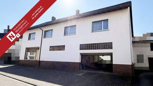 Titelbild - Großzügiges Ein- bis Zweifamilienhaus mit Garten, XXL-Garage und Ausbaureserve