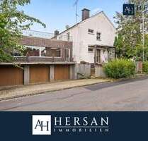 Haus mit Seltenheitswert: Dachterrasse, 3 Garagen & viel Potenzial in Jülich!