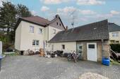 Rückansicht - Willkommen zuhause: Gepflegte Doppelhaushälfte inkl. Schuppen in Sandersdorf-Brehna
