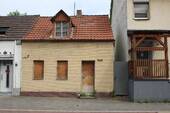 Bild 1 - Projektentwickler Investoren ausgepasst! Baugrundstück 287 m² in Köln-Weiden mit einem alten Haus