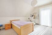 Schlafzimmer mit Zugang zur Dachterrasse - 