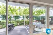 Blick aus dem Wohnzimmer - Doppelhaushälfte mit 104,00 m² in Stocksee zum Kaufen