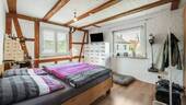 1. OG Schlafzimmer 1 - 