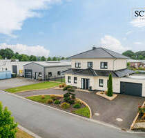 **Vielseitiges Anwesen mit luxuriösem Wohnkomfort und Gewerberaum in Cloppenburg!**