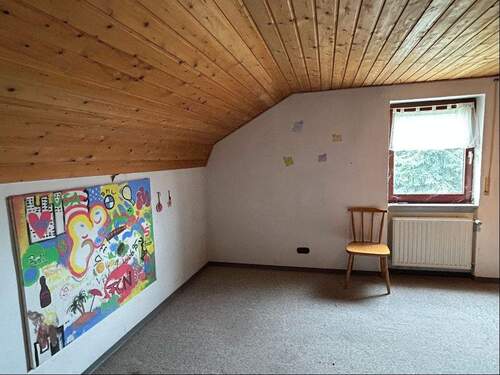 Gäste- oder Kinderzimmer im Dachgeschoss - 