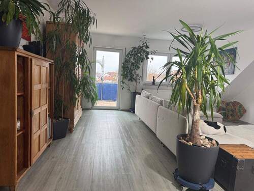 Wohnzimmer - Etagenwohnung mit 90,80 m&sup2; in Birkenheide zum Kaufen